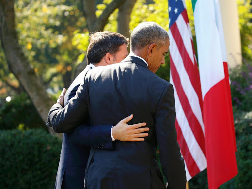 US President Barack Obama (R) and Italian Prime Minister Matteo Renzi walk together after holding a joint news conference in the Rose Garden of the White House in Washington, US, October 18, 2016. /REUTERS