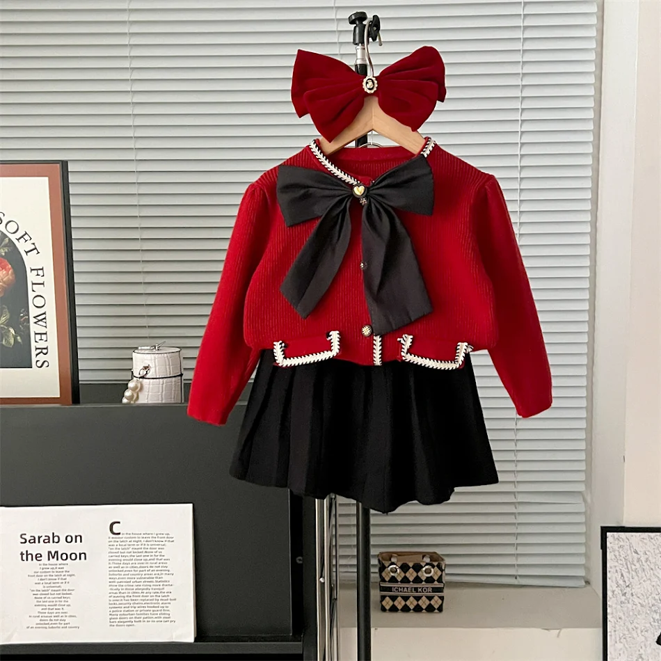 Robe classique en tricot avec manches bouffantes et nœud, idéale pour l'automne et l'hiver, élégante et confortable, parfaite pour un look sophistiqué.