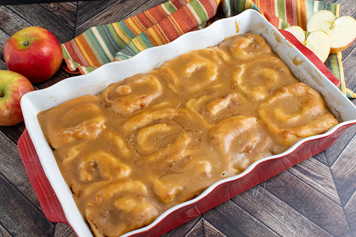 A tray of Apple Rolls With Caramel Topping.