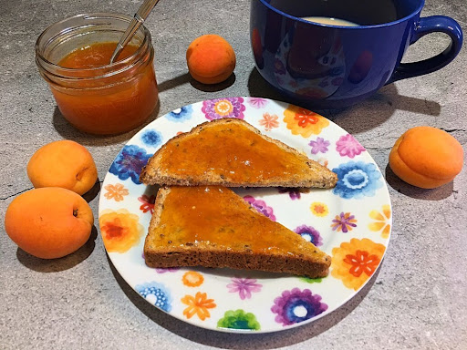 A delicious jar of Apricot Jam for your breakfast or brunch menu.