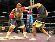 Mapule 'Thunder' Ngubane about to pounce on Julie Tshabalala    during their recent welterweight fight    in Polokwane.  / Philip Maeta / Gallo Images