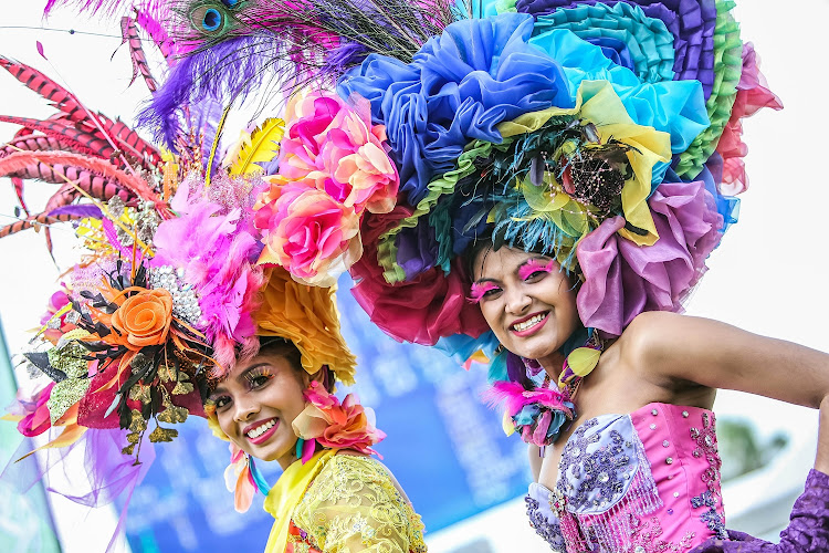 A pair of race goers in elaborate hats at the 2017 Vodacom Durban July.