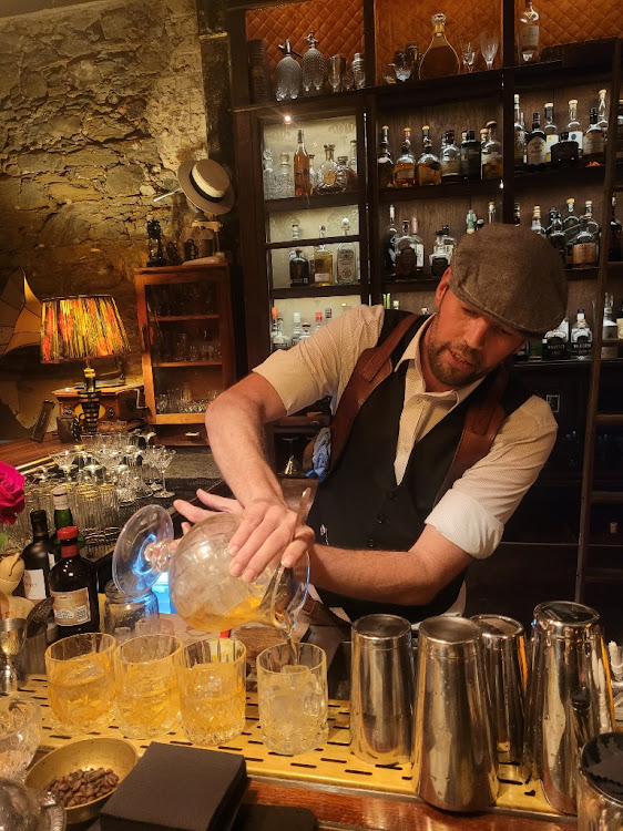 Mixologist Justin Shaw behind the bar.