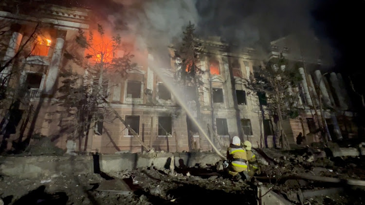 Firefighters work at a site of a building damaged by a Russian missile strike in this screenshot taken from a handout video released on April 27 2023. Picture: STATE EMERGENCY SERVICE OF UKRAINE/REUTERS