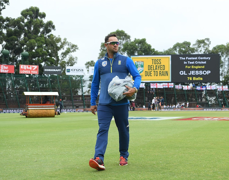 South Africa coach Mark Boucher leaves the field after inspecting the conditions as the toss is delayed during Day One of the Fourth Test between South Africa and England at The Wanderers on January 24, 2020 in Johannesburg, South Africa.