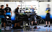  The Williams team work in the garage after practice for the F1 Grand Prix of Japan at Suzuka Circuit on October 11, 2019 in Suzuka, Japan.