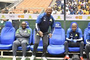 Mamelodi Sundowns coaches Pitso Mosimane and Manqoba Mngqithi during the Shell Helix Ultra Cup match between Mamelodi Sundowns and Kaizer Chiefs at FNB Stadium on October 12, 2019 in Johannesburg, South Africa. 