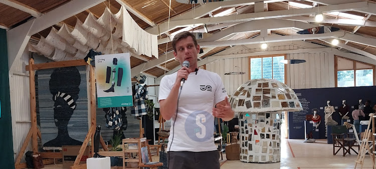 Nairobi Design Week founder and director Adrian Jankowiak speaks during the launch at Opportunity Factory in Karen, Nairobi, on March 8