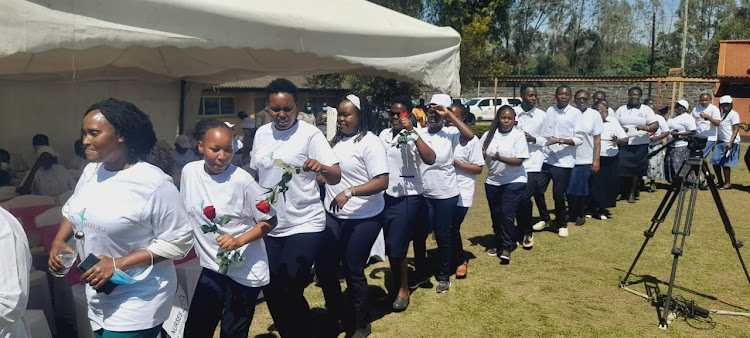 Nurses at the Rift Valley Provincial General Hospital dance during the International Nurses Day celebrations on May 12, 2022.