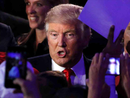 US President elect Donald Trump greets supporters at election night rally in Manhattan, New York, November 9, 2016. /REUTERS