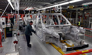 Aluminium bodied Range Rovers in production at the Jaguar Land Rover plant in Solihull.