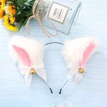 White plush bell pins