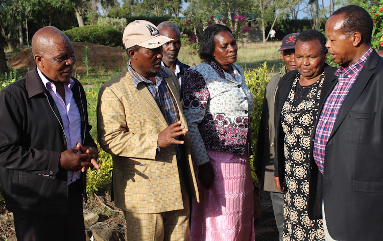 Nyeri senator Ephraim Maina (right) when he met with tea farmers representatives at his Lusoi home in Kieni, Nyeri County in March