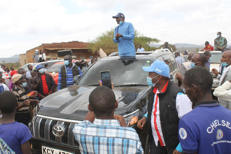 Wiper leader Kalonzo Musyoka with his Ford Kenya counterpart Moses Wetangula in Kibwezi West, Makueni on Monday.