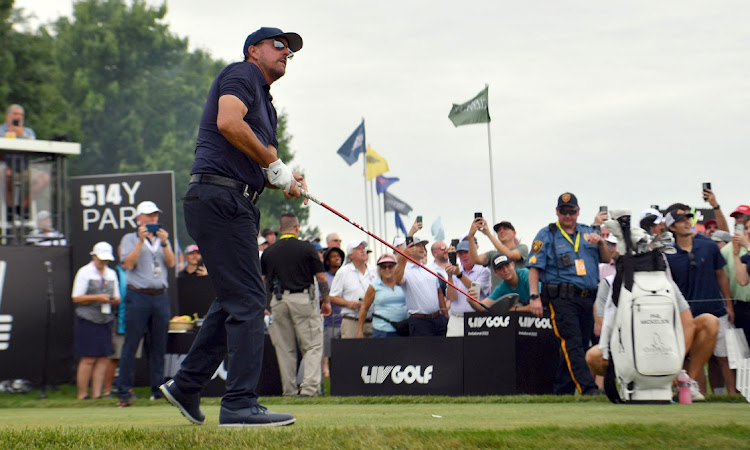 Phil Mickelson plays his shot from the first tee during the first round of a LIV Golf tournament at Trump National Golf Club Bedminster on July 29, 2022 in Bedminster, New Jersey