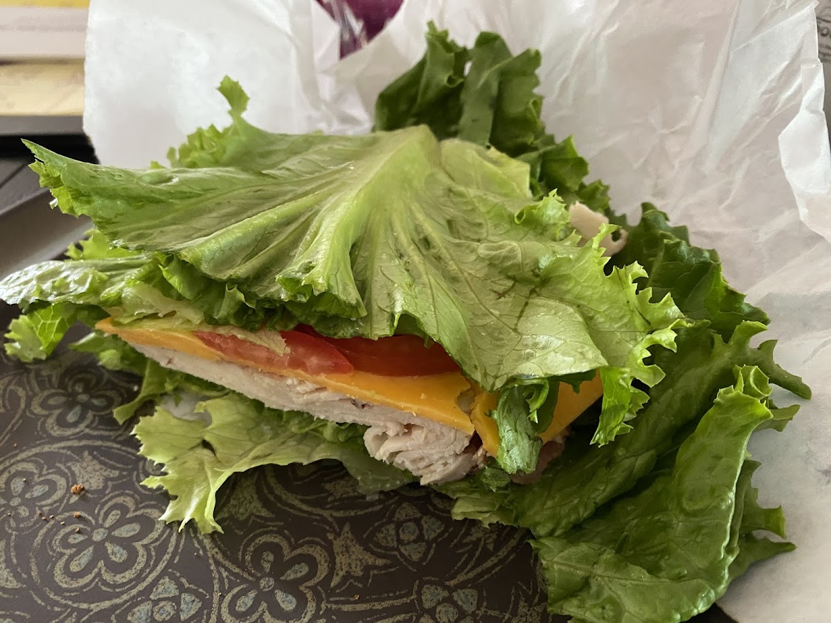 Lots of very fresh lettuce in place of bread.