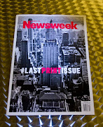 This December 24, 2012 photo shows the final print edition of Newsweek, seen here in Washington, DC. Newsweek ends its 80-year run as a weekly news magazine with a final print edition published this week with a December 31, 2012 date. The magazine went with a vintage photo of its old Midtown Manhattan headquarters in New York for the cover shot and a Twitter hashtage headline of 