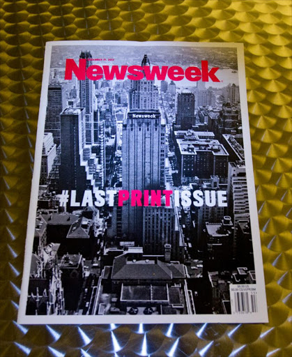 This December 24, 2012 photo shows the final print edition of Newsweek, seen here in Washington, DC. Newsweek ends its 80-year run as a weekly news magazine with a final print edition published this week with a December 31, 2012 date. The magazine went with a vintage photo of its old Midtown Manhattan headquarters in New York for the cover shot and a Twitter hashtage headline of "#lastprintissue.”