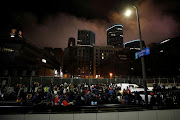 Activists march through downtown on the tenth day in the trial of former police officer Derek Chauvin, who is facing murder charges in the death of George Floyd, in Minneapolis, Minnesota, US, April 9, 2021. 