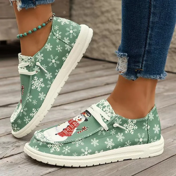 Damskie buty w kształcie bałwanka świątecznego. Idealne na święta Bożego Narodzenia i inne okazje. Wygodne i stylowe obuwie na zimę.