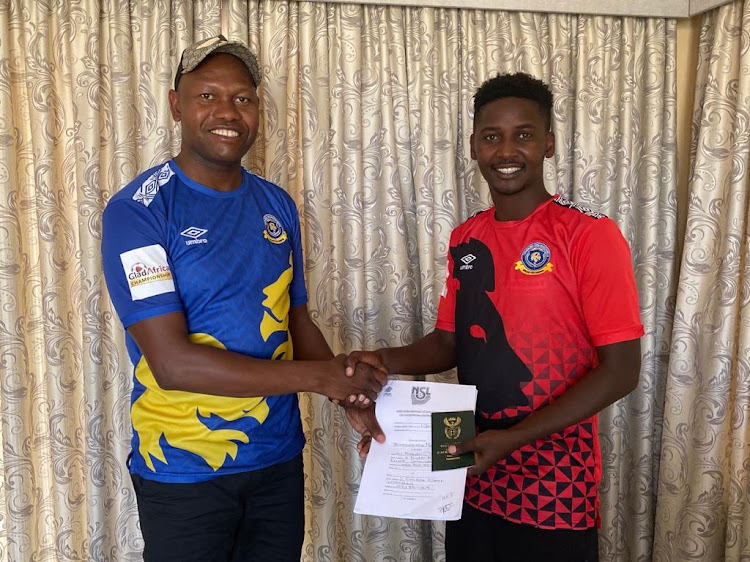 Masibusane Zongo (R) pose for a photograph with a Tshakhuma Tsha Madzivhandila FC official after he signed for the GladAfrica Championship.