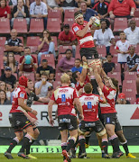 Lourens Erasmus of the Lions with possession during the Super Rugby match between Emirates Lions and Cell C Sharks at Emirates Airline Park on February 17, 2018 in Johannesburg. 
