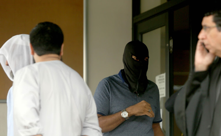 Farhad Hoomer, the alleged mastermind behind a series of bomb attacks in Durban, donned a black balaclava to hide his face during one of his first appearances, in 2018.