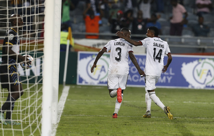 Thembinkosi Lorch celebrates scoring the winning goal with Orlando Pirated teammate Monnapule Saleng in the Nedbank Cup last 16 match against Venda Football Academy at Orlando Stadium on March 11 2023.