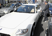 THE DRINKER, HIS DRIVER AND THE MASERATI: ANC NEC member Tony Yengeni leaves the Cape Town Magistrate's Court yesterday