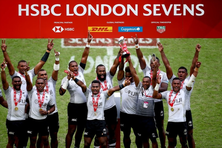 Fiji lift the trophy after victory in the Cup Final match between Fiji and South Africa on day two of the HSBC London Sevens at Twickenham Stadium on June 3, 2018 in London, United Kingdom.