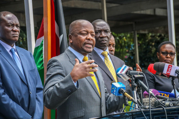 Acting Director General of Health Patrick Amoth, Health CS Mutahi Kagwe and GoveRnment Spokesman Cyrus Oguna address the media at Afya House on March 18, 2020