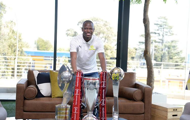 Mamelodi Sundowns captain Hlompho Kekana with the three trophies during the Hyundai Sundowns Lounge: The Road to La Decima Interview Opportunity with Mamelodi Sundowns at Hyundai Head Office on September 14, 2020 in Johannesburg, South Africa.