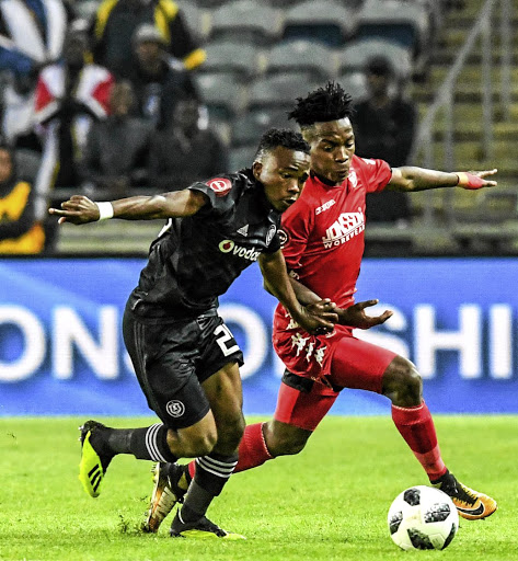 Paseka Moko of Orlando Pirates, left, fends off the challenge of Thabo Motlafi of Highlands Park during the PSL match at Orlando Stadium on August 4 last year. /Gallo Images/ Sydney Seshibedi