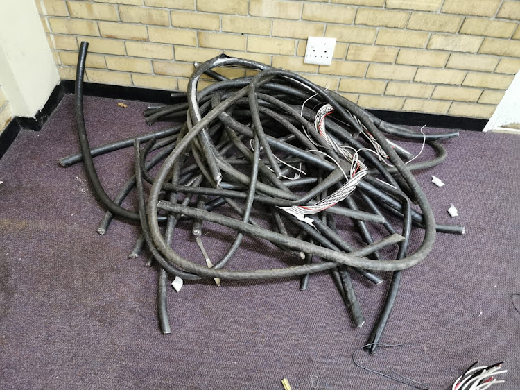 Suspects were arrested with 96kg of cable in the boot of their car after trying to sell the cable to a scrap dealer.