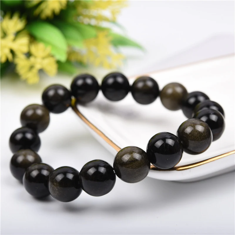 Pulseira de obsidiana de ouro