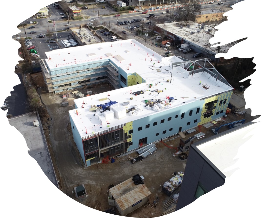 Outside overview of Restoration House building during construction