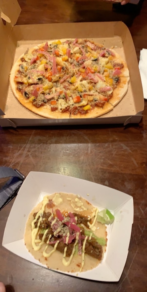 Pizza and bison tacos