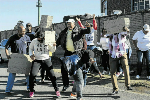 STANDING FIRM: SAPS 10111 call centre operators affiliated to the South African Police Union picketed outside the call centre in Greenfields yesterday as part of a nationwide strike. Picture: RANDELL ROSKRUGE