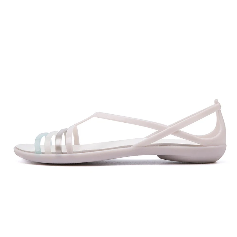 Chinelos Jelly Novos de Primavera e Verão Femininos TPU Planos Antiderrapantes Sandálias Vazadas Fashion Conforto e Estilo para o Verão