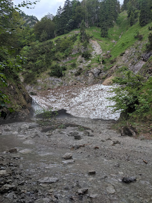 Snow residues, challenging to cross as it melts fast now