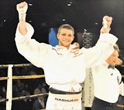 GREAT VICTORY: IBO super middleweight champion Thomas 'Tommy Gun' Oosthuizen.Photo: Gallo Images