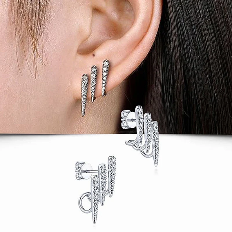 Boucles d'oreilles élégantes à trois rangées de zircon, design de luxe discret, raffinement simple, pour un look sophistiqué et intemporel.