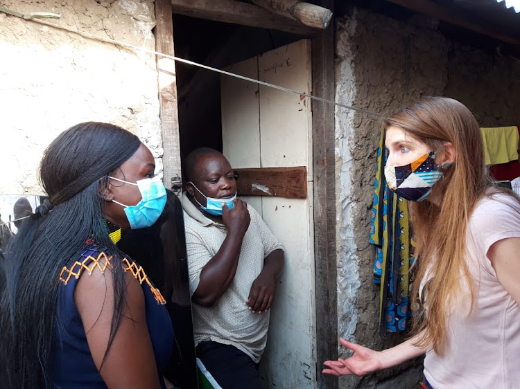 British High Commissioner to Kenya, Jane Marriott during her visit to vulnerable families in Mombasa.