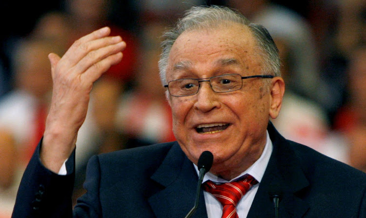 Romania's former president Ion Iliescu gestures while announcing his support for the head of Romania's Social Democrat party, Mircea Geoana, for the November 22 presidential elections during an extraordinary congress of his party in Bucharest in this October 2 2009 file photo. Picture: REUTERS/BOGDAN CRISTEL