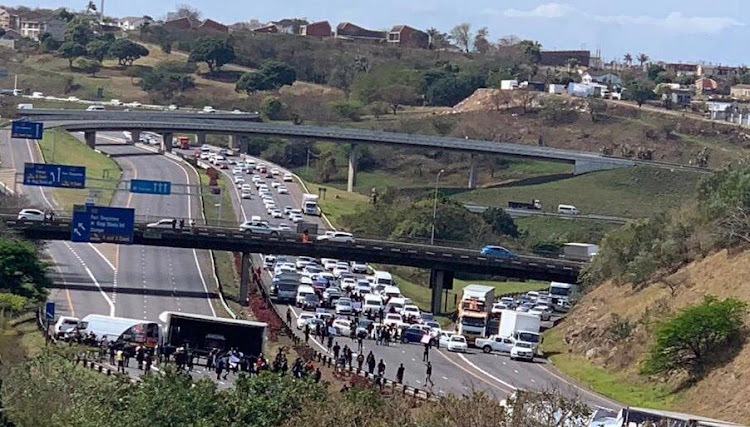 The N3 near Spaghetti Junction has been closed in both directions by protesters who have not made clear what they are objecting to.