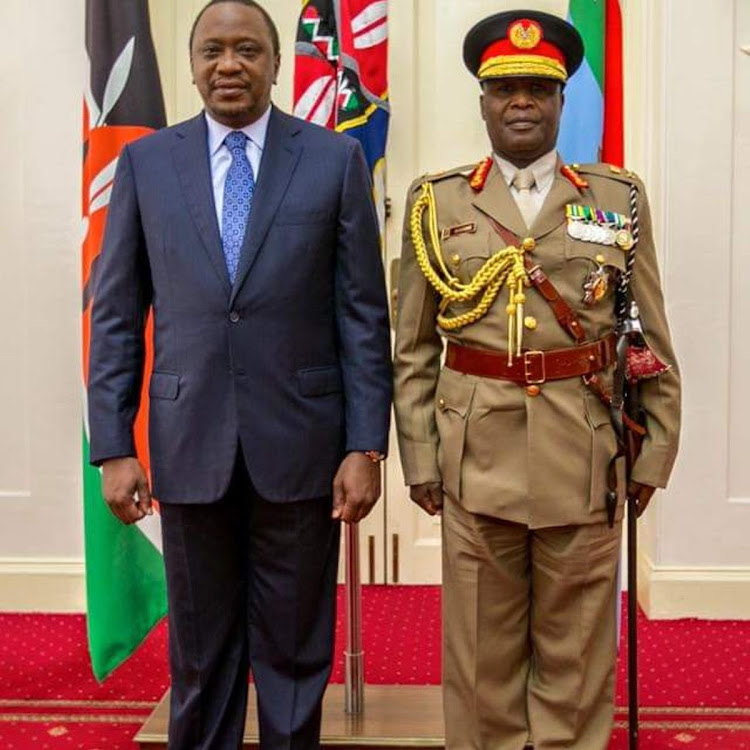 President Uhuru Kenyatta with Gen Robert Kibochi.