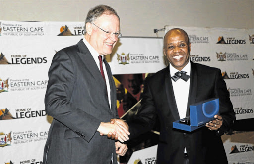 TWO-WAY STREET: The delegation from German's Lower Saxony province touched down in East London yesterday and enjoyed a reception dinner at the East London ICC with, from left, Lower Saxony Prime Minster Stephan Weil and premier Phumulo Masualle where the latter received a fountain pen from his German counterpart Picture: ZOLILE MENZELWA