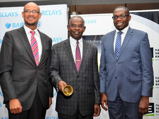 Barclays Bank of Kenya CEO Jeremy Awori(L), National Treasury Principal Secretary Kamau Thugge(C) and Nairobi Securities Exchange Limited CEO Geoffrey Odundo (R) in Nairobi during the launch and listing of the NewGold ETF, a product by the Barclays Africa Group Limited on 27/03/2017