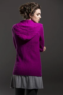 lady in studio showing back of purple knitted hoodie