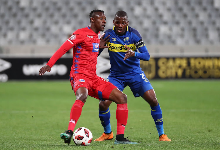 Evans Rusike of Supersport United challenged by Thamsanqa Mkhize of Cape Town City FC during the Absa Premiership 2018/19 football match between Cape Town City FC and SuperSport United at Cape Town Stadium, Cape Town on 4 August 2018.